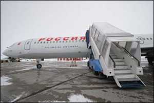 Об обложении страховыми взносами на ОПС и ОМС стоимости оплаты проезда членов семьи к месту проведения отпуска