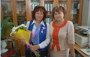 Удостоена нагрудного знака «Отличник ПФР»         